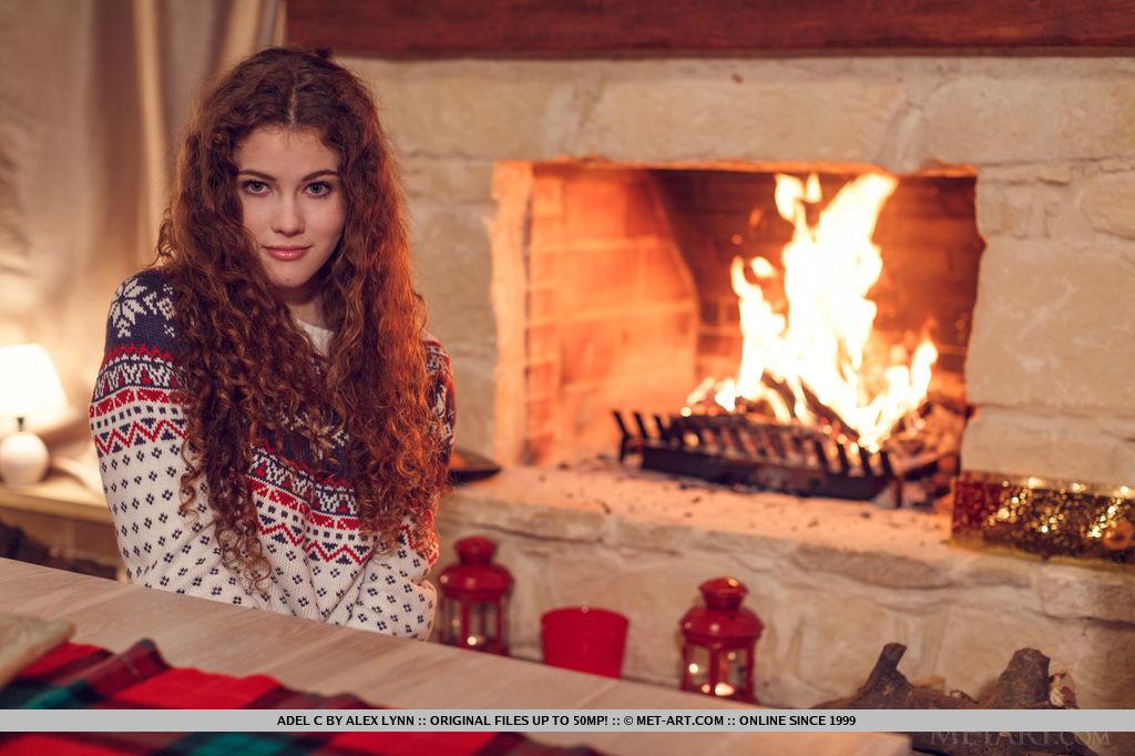 Brunette teen Adel C curls up by the fireplace for the holidays #52898097