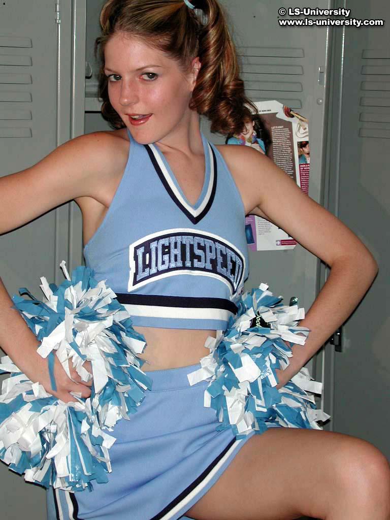 Pictures of a cute cheerleader flashing her tits in the locker room #60175570