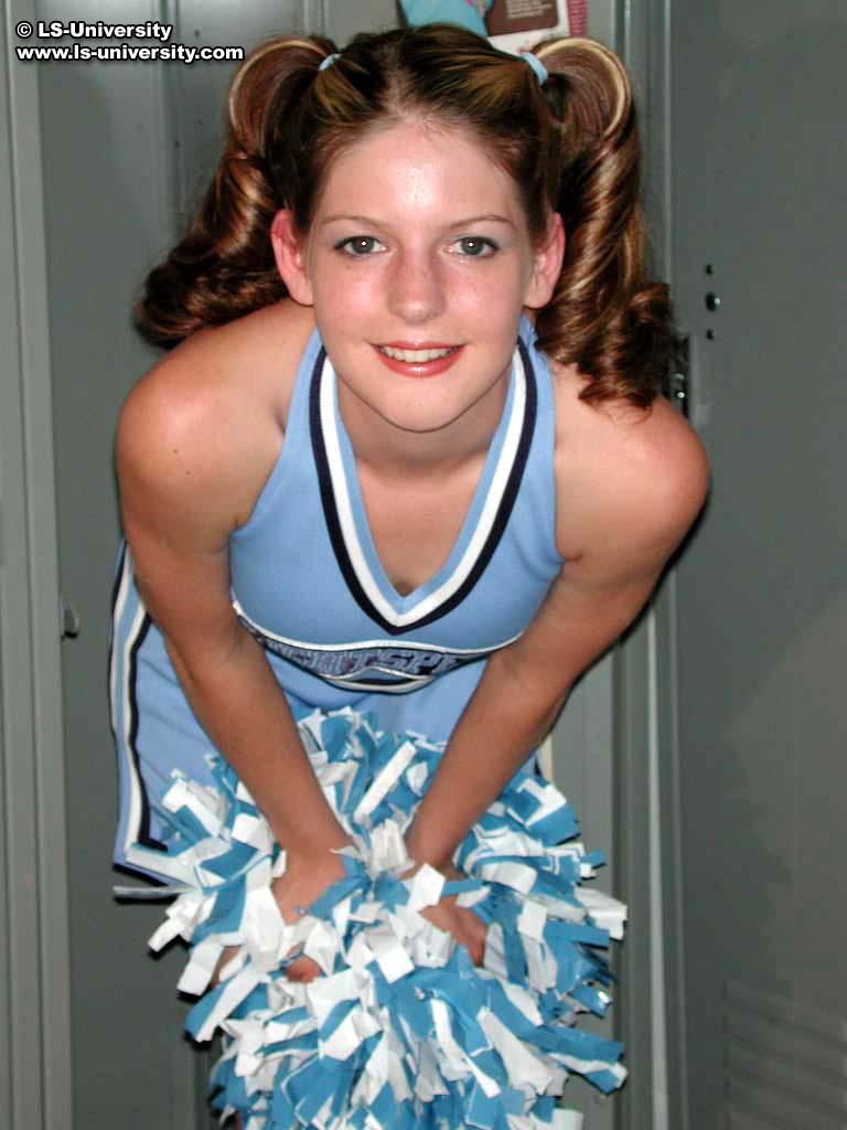 Pictures of a cute cheerleader flashing her tits in the locker room #60175583