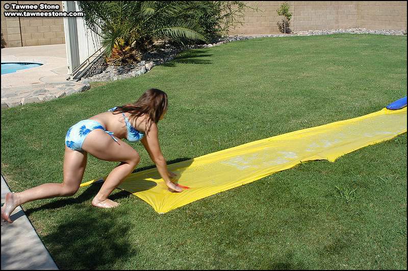 Tawnee and Taylor have some fun on the slip n slide #60064413