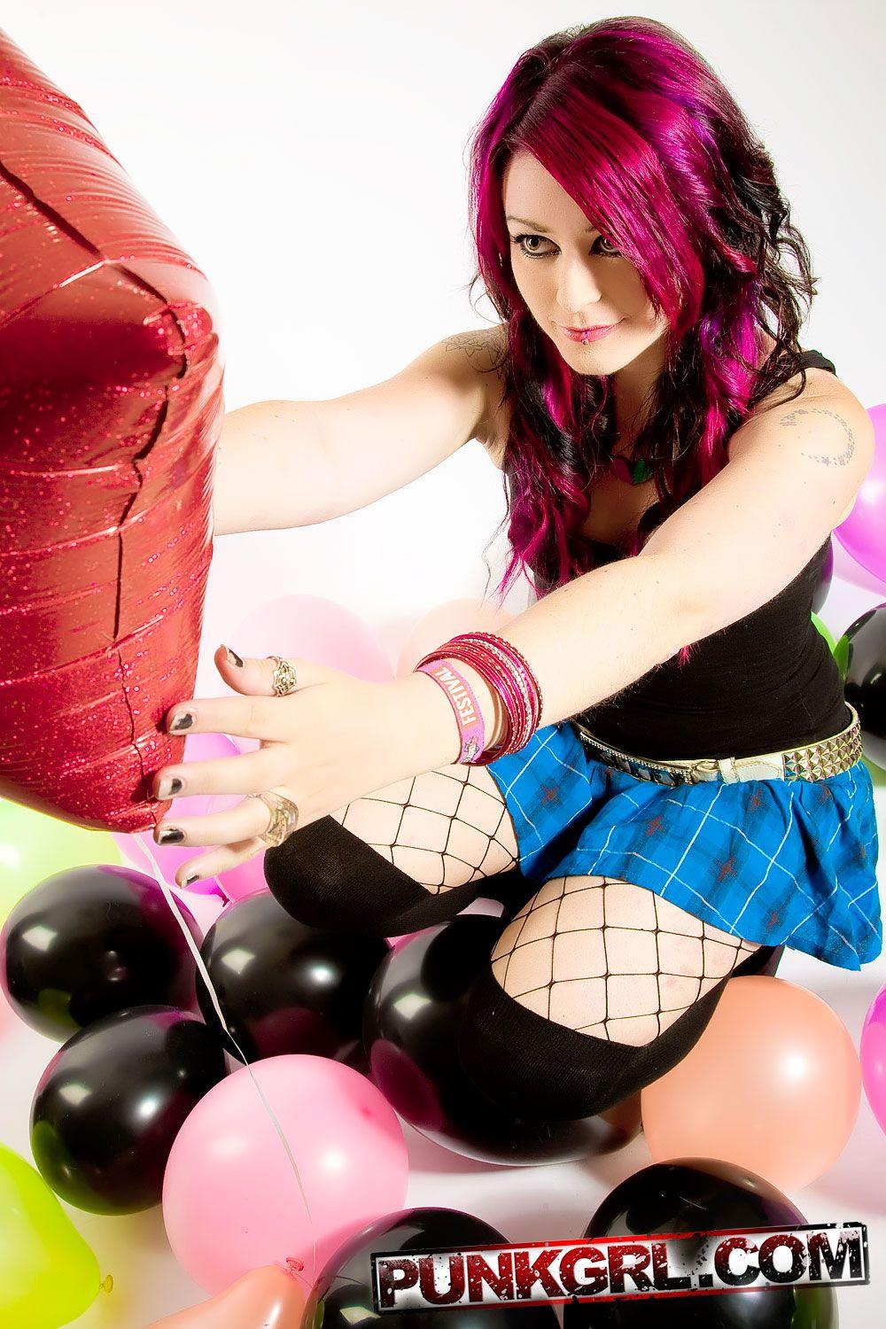 Pictures of Miss Kitty playing with balloons #59582540
