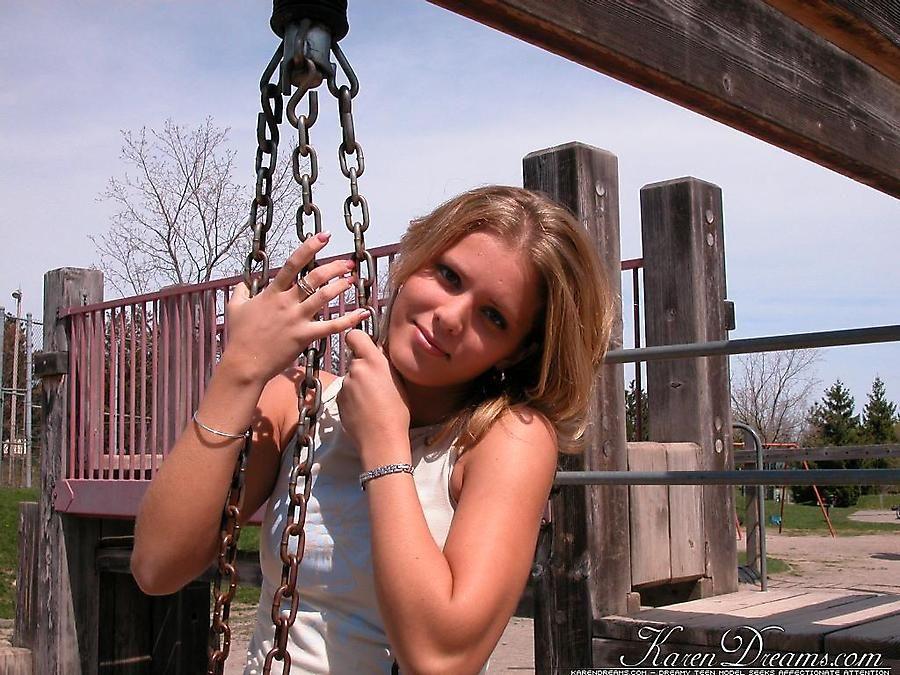 Pictures of teen babe Karen Dreams teasing at a park #57997282