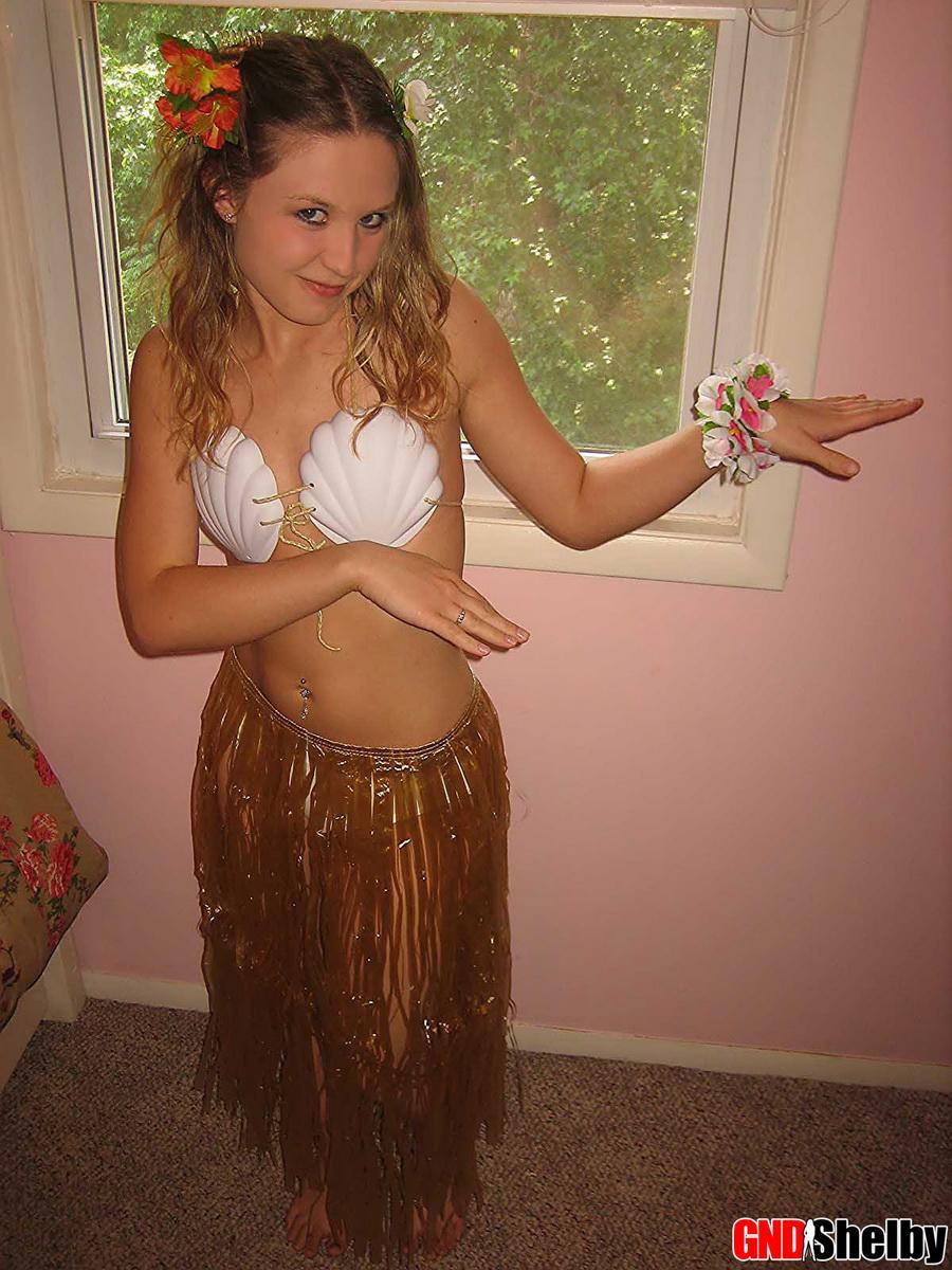 Petite teen Shelby strips out of her skimpy hula girl costume exposing her perky perfect tits #58761180