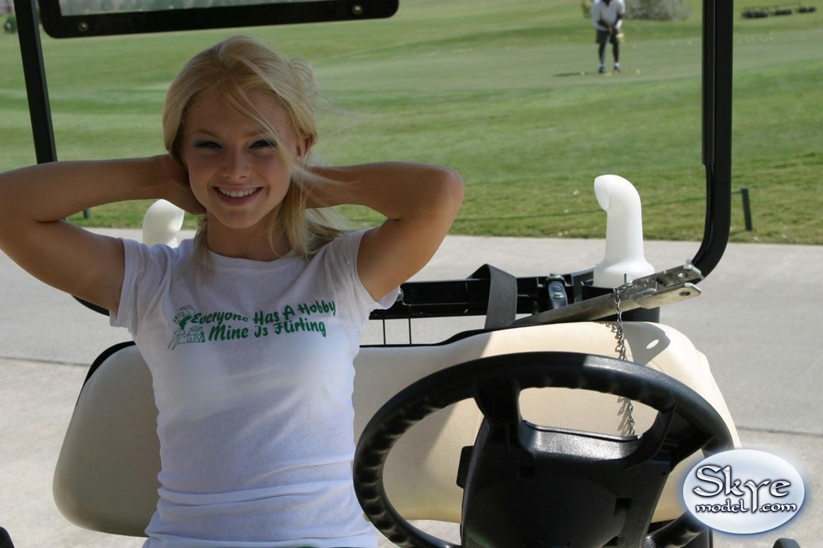 Skye model playing on golf course #59831404