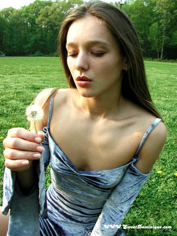 Pictures of Sweet Dominique teasing in a park #60029094