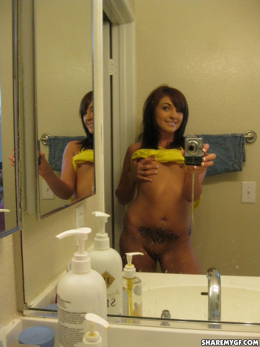 Perky girlfriend takes selfshot pictures of her shaved pussy #60789887