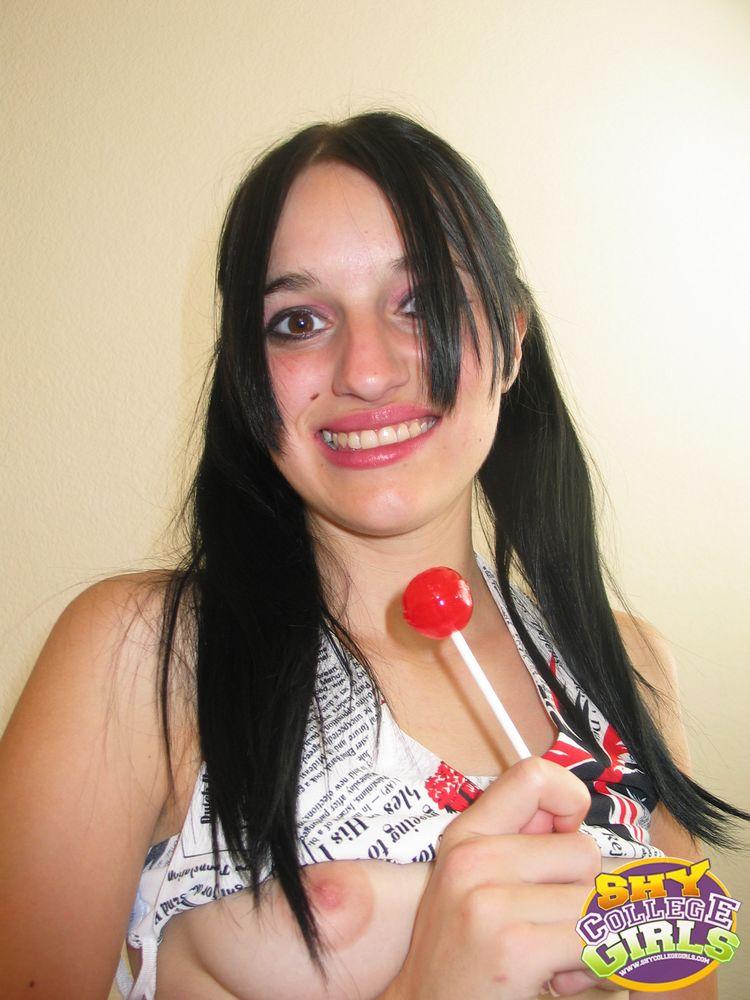 Pictures of a teen in pigtails sucking on a lolipop #60809335