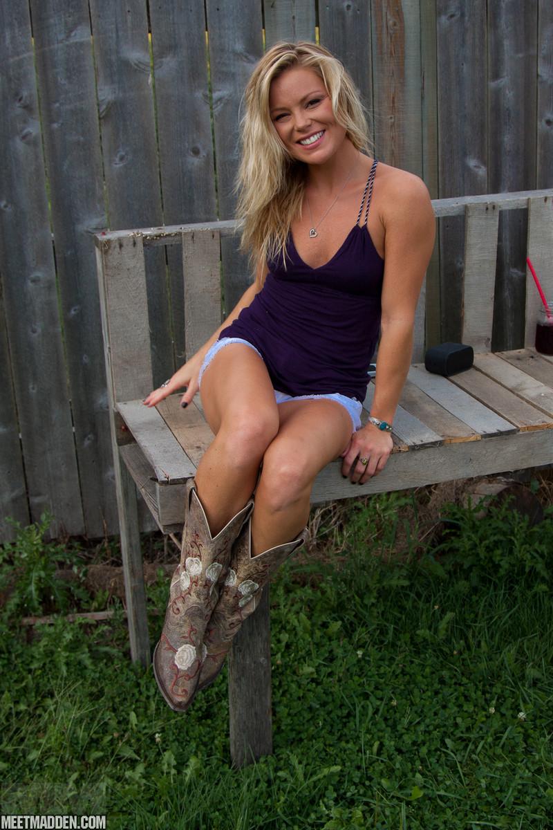 Blonde country girl Madden tends to her flowers outside #59451297