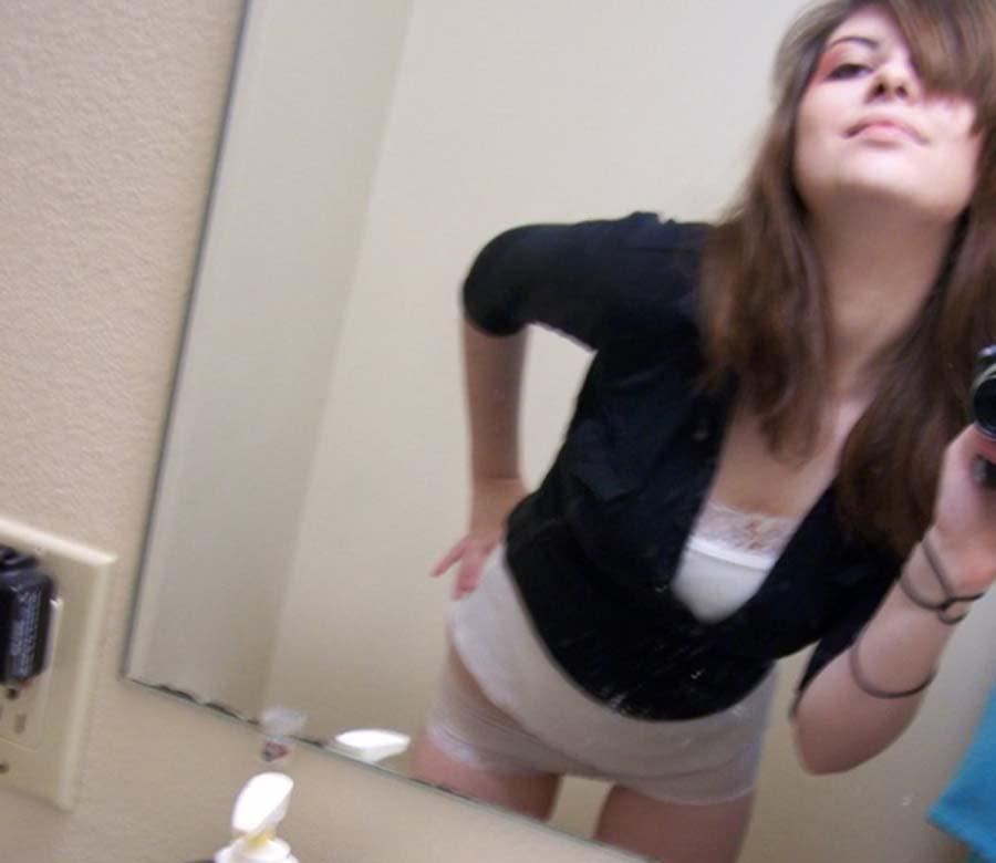 Pictures of a hot brunette girl taking pics of herself #60661875