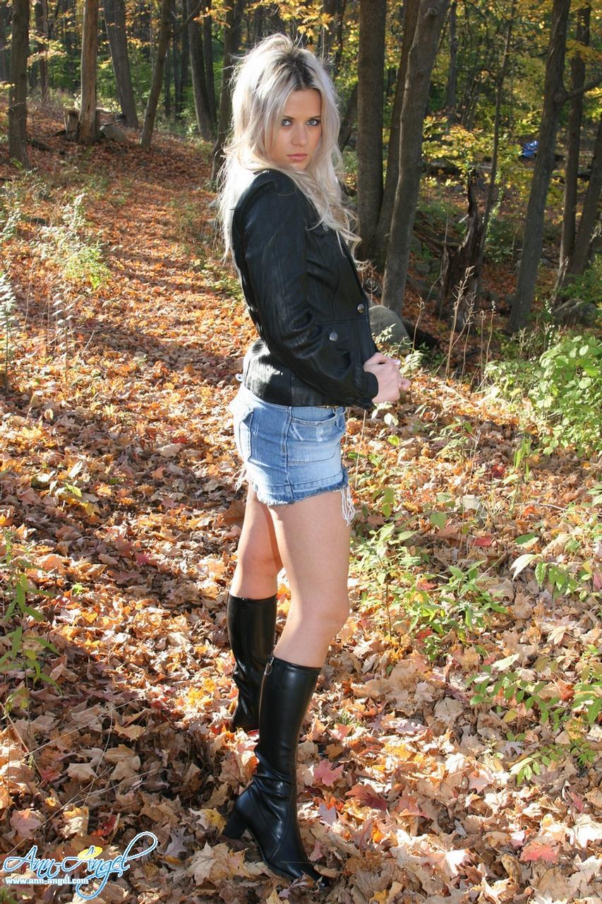 Ann Angel goes for a walk in her jean miniskirt and leather jacket #53215923