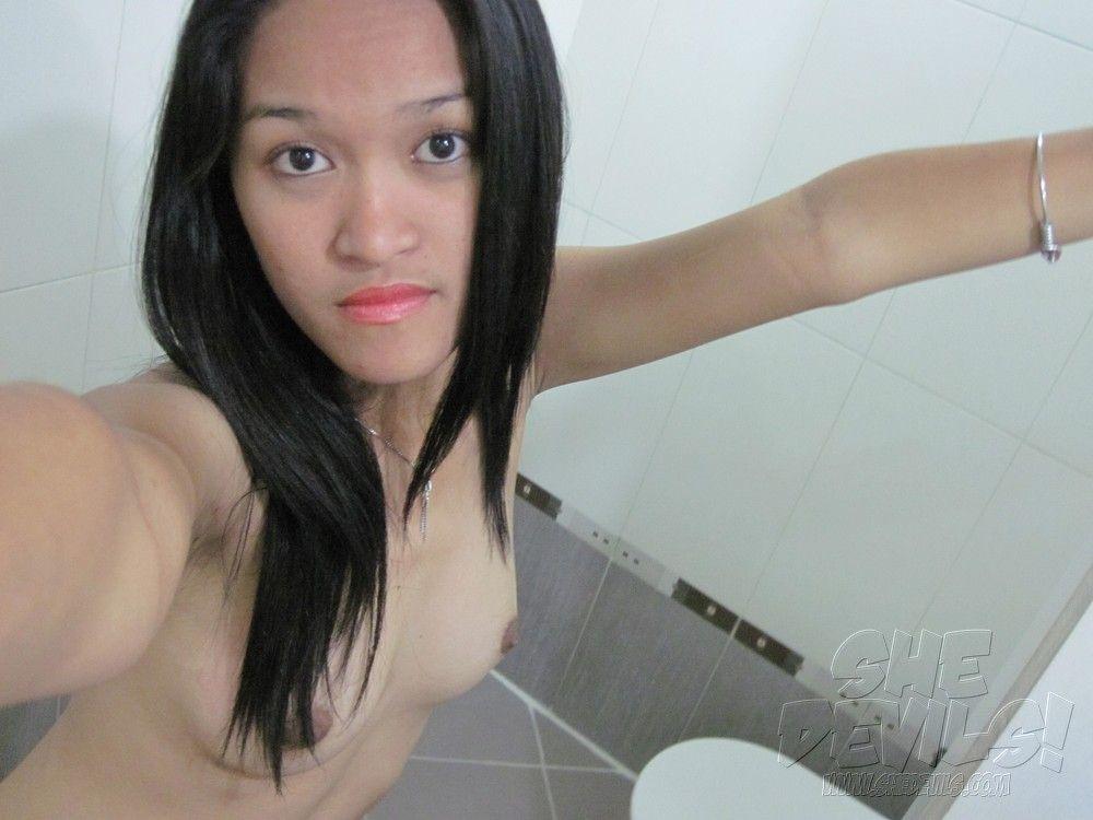 Pictures of a hot asian teen gf taking pics of herself #60800915