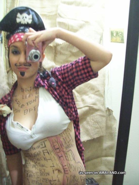 Cute brunette girlfriend self-shooting in pirate costume #60658738