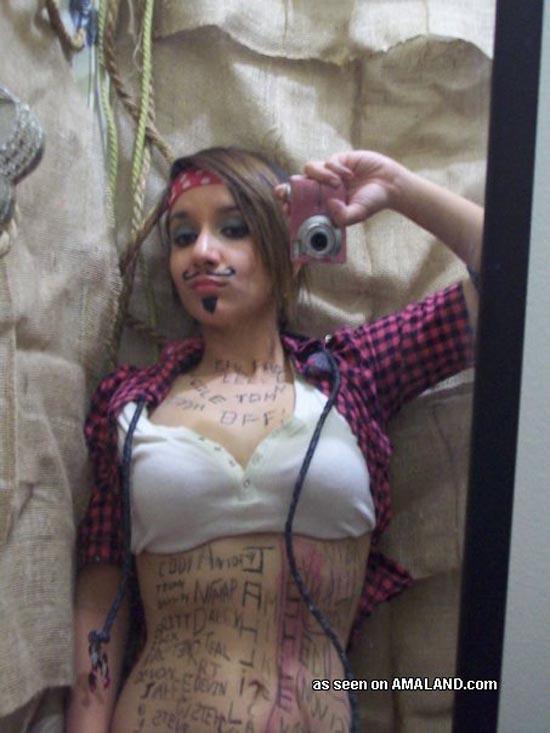 Cute brunette girlfriend self-shooting in pirate costume #60658882