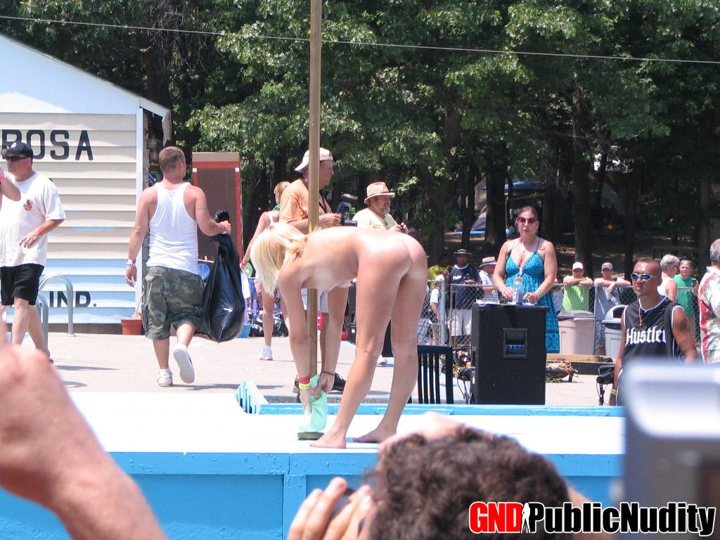 Random naked people at an outdoor public nudity party #60506938