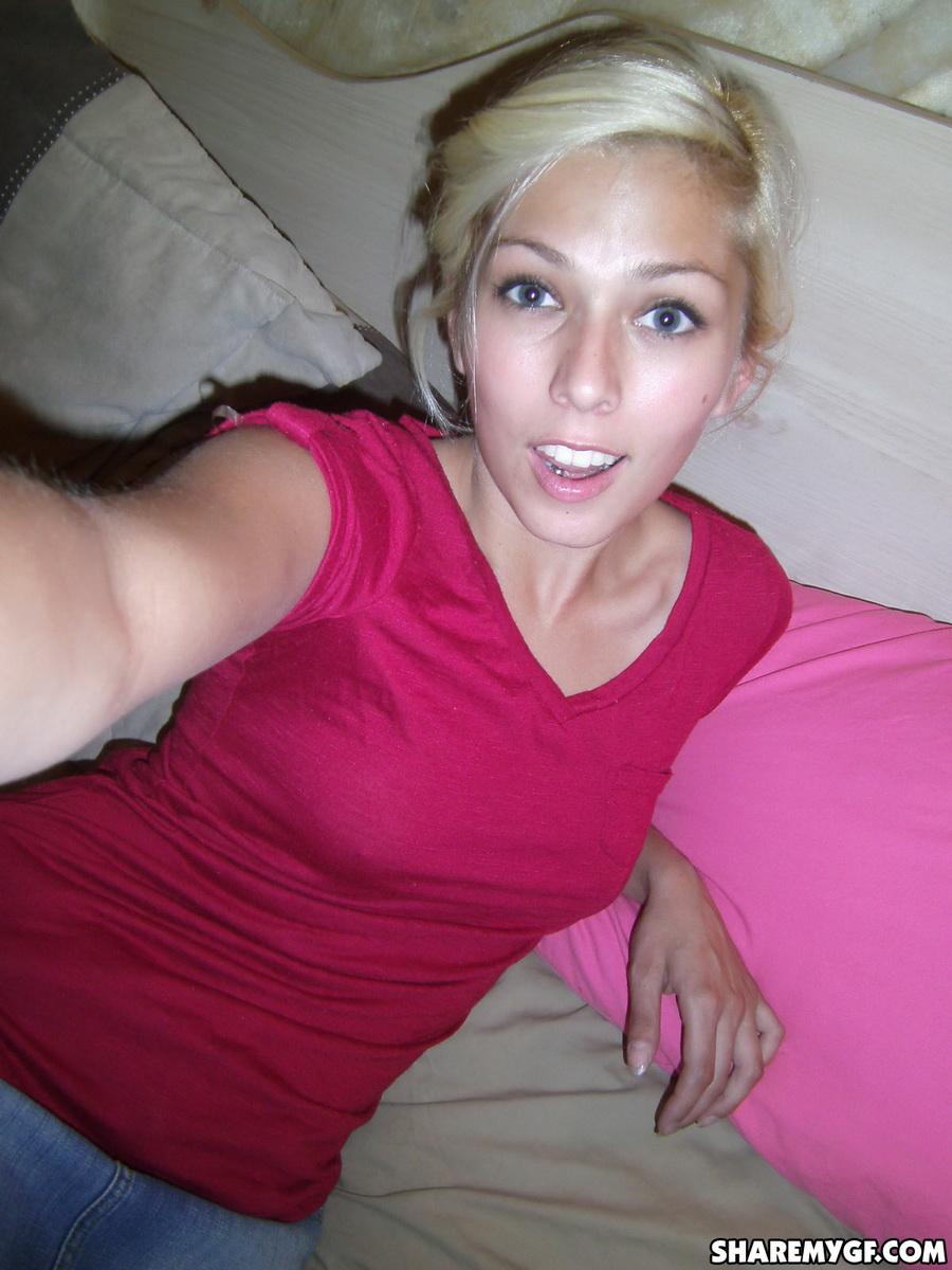 Cute blonde takes selfshot pictures of her perky tits and tight pussy #60792399