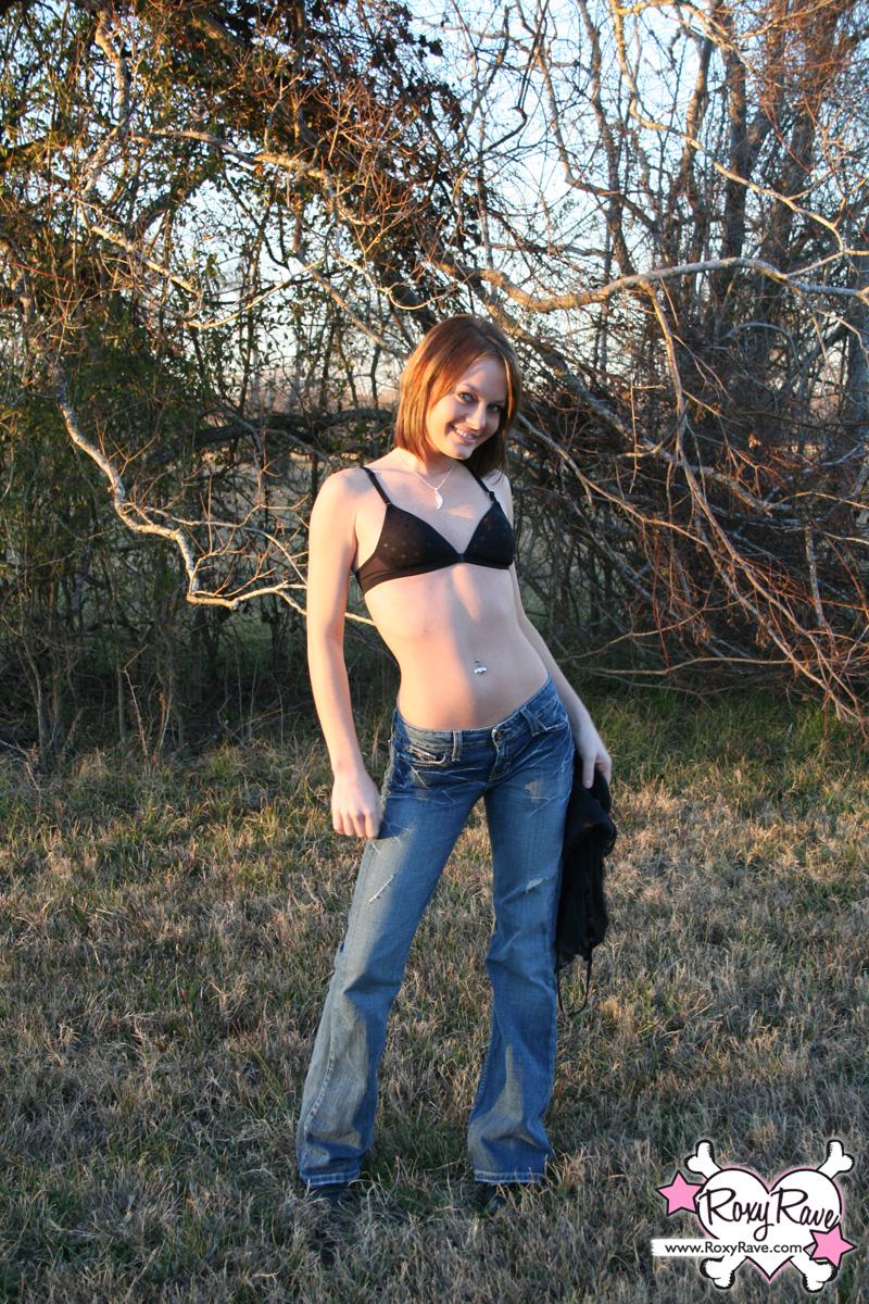 Pictures of teen star Roxy Rave teasing outside in her jeans #59880117