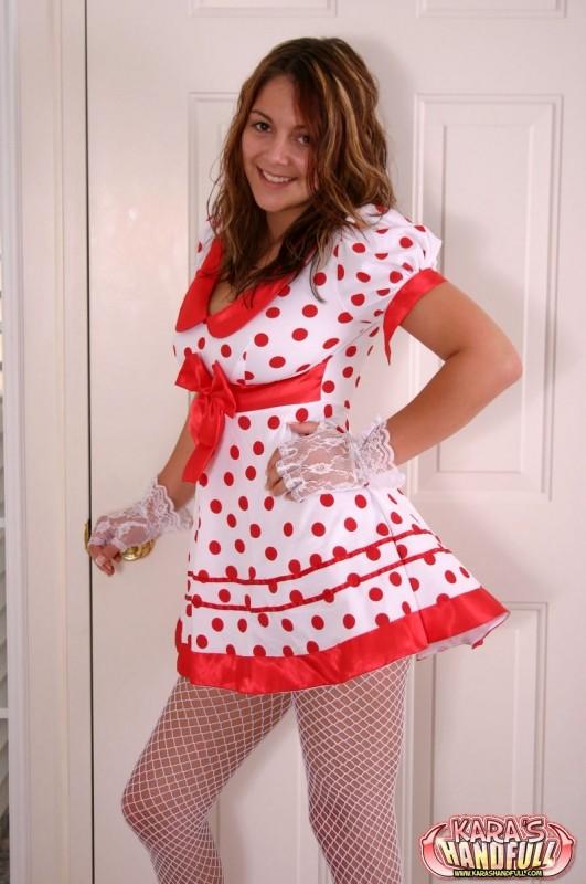 Kara con un vestido de polkadot con medias y calcetines blancos
 #55967178