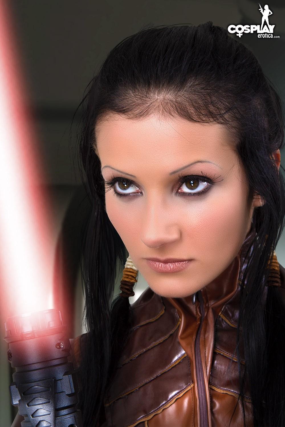 Beautiful cosplay girl Zorah shows how she can handle a light saber #60211148