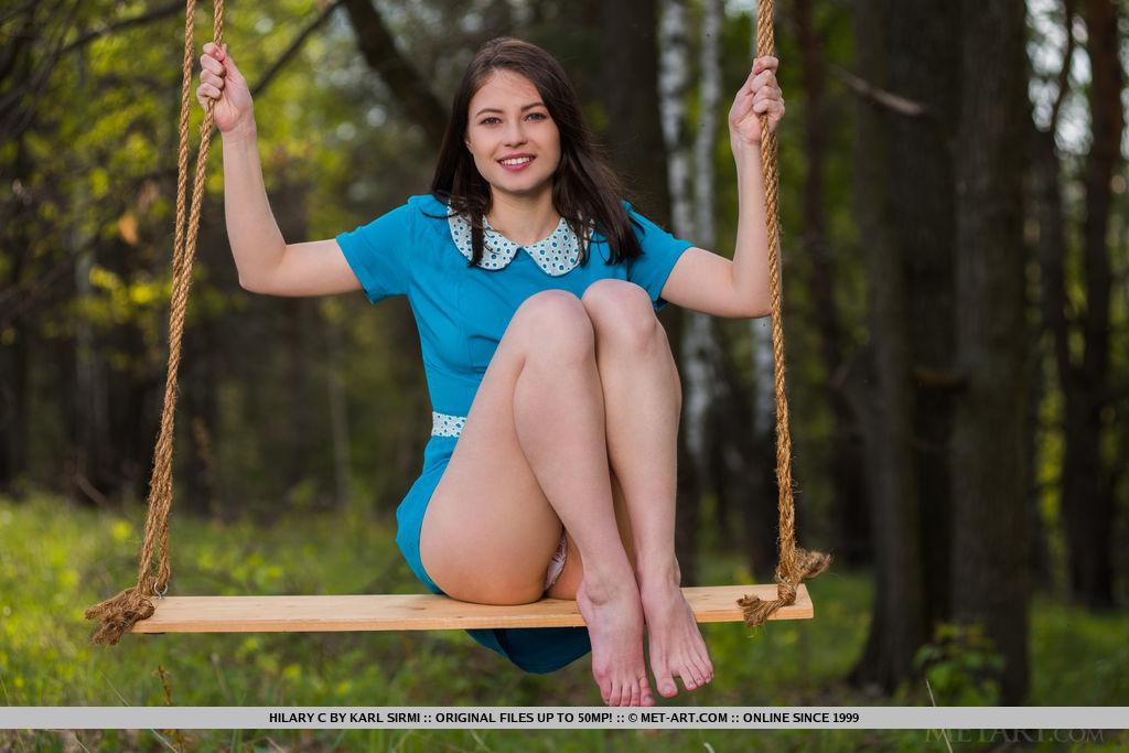 Brunette coed Hilary C gets naked on a swing in "Porrea" #54785927
