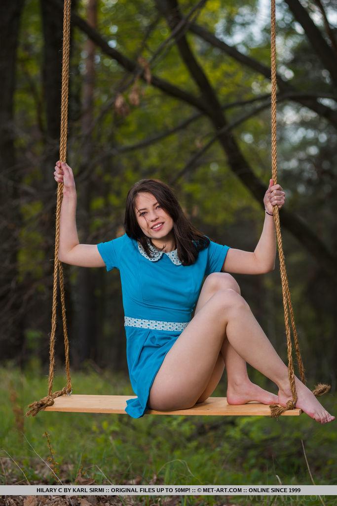 Brunette coed Hilary C gets naked on a swing in "Porrea" #54785948