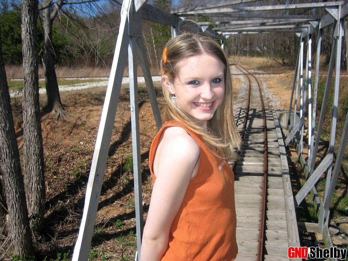 Cute petite teen Shelby flashes her perky tits outdoors at the public park #58761013