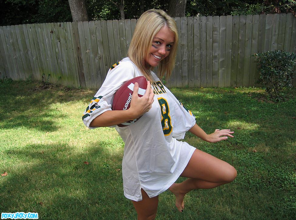 Pictures of teen babe Foxy Jacky playing football in the back yard #54398481