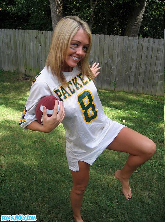 Pictures of teen babe Foxy Jacky playing football in the back yard #54398502