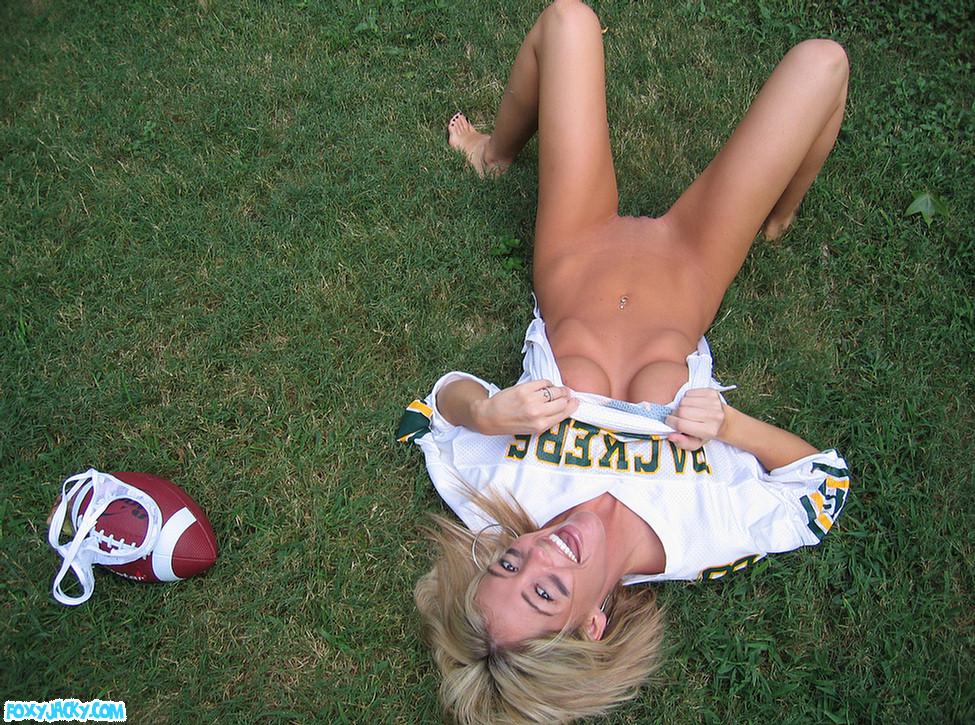 Pictures of teen babe Foxy Jacky playing football in the back yard #54398946