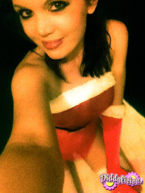 Pictures of Diddylicious taking sexy pics of herself in a santa costume #54055665