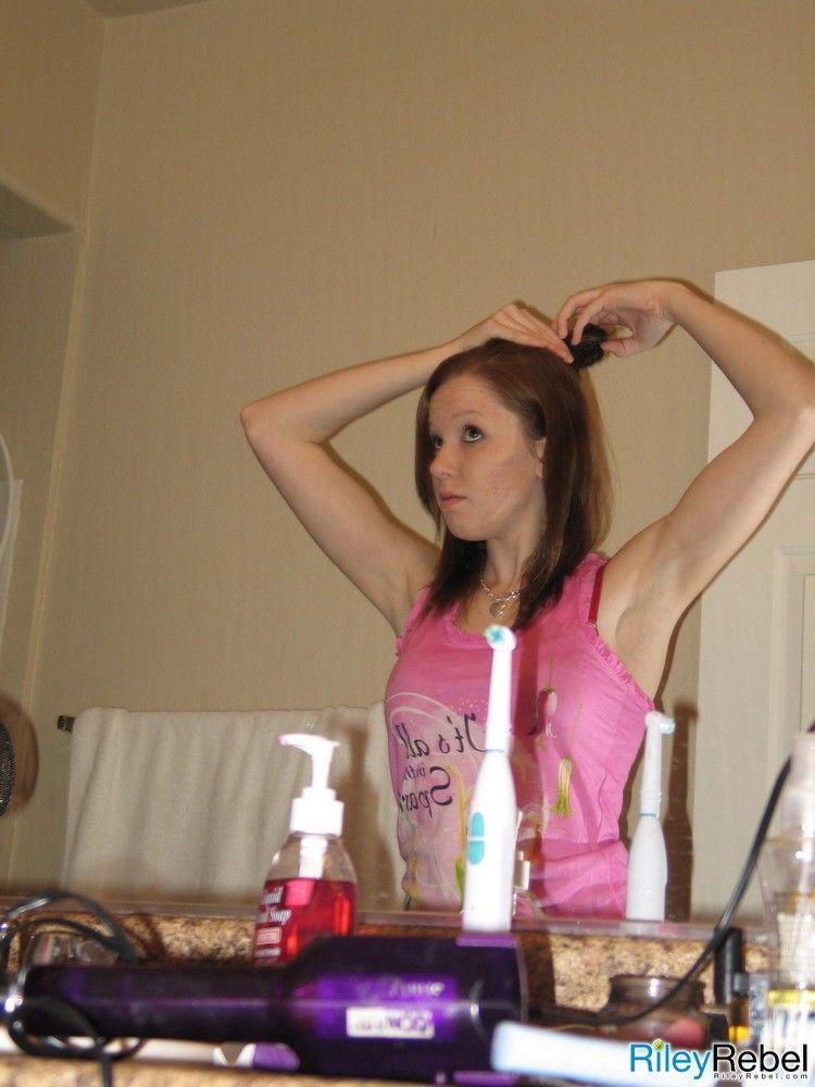 Pictures of teen Riley Rebel doing her makeup and hair #59871117