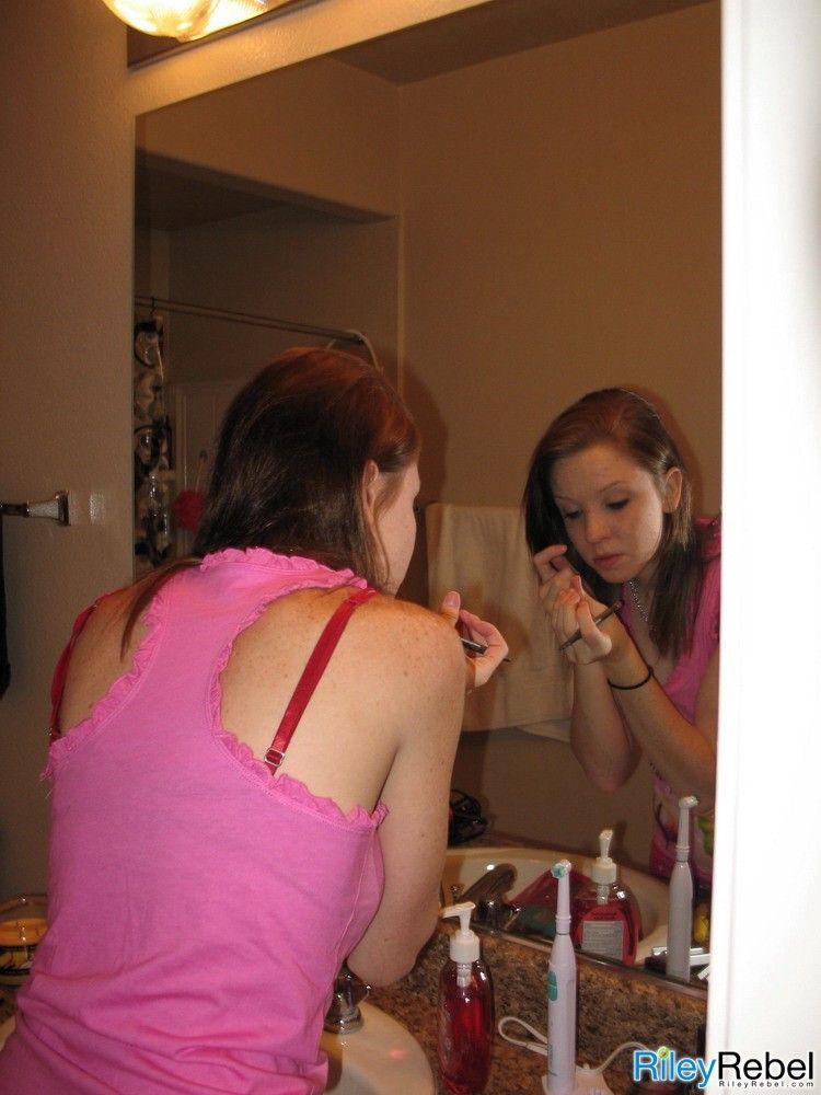 Pictures of teen Riley Rebel doing her makeup and hair #59871174