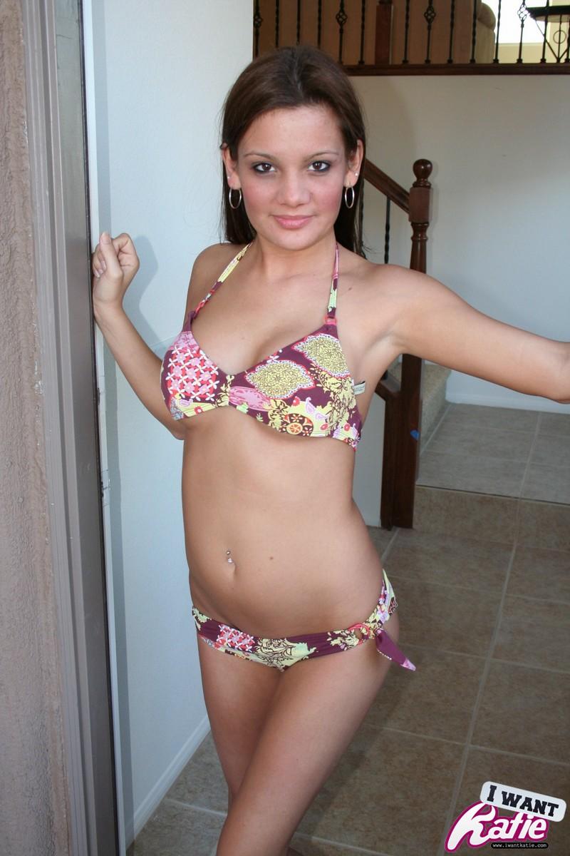Teenage slut Katie welcomes you to her home by stripping out of her bikini at the front door #58046921