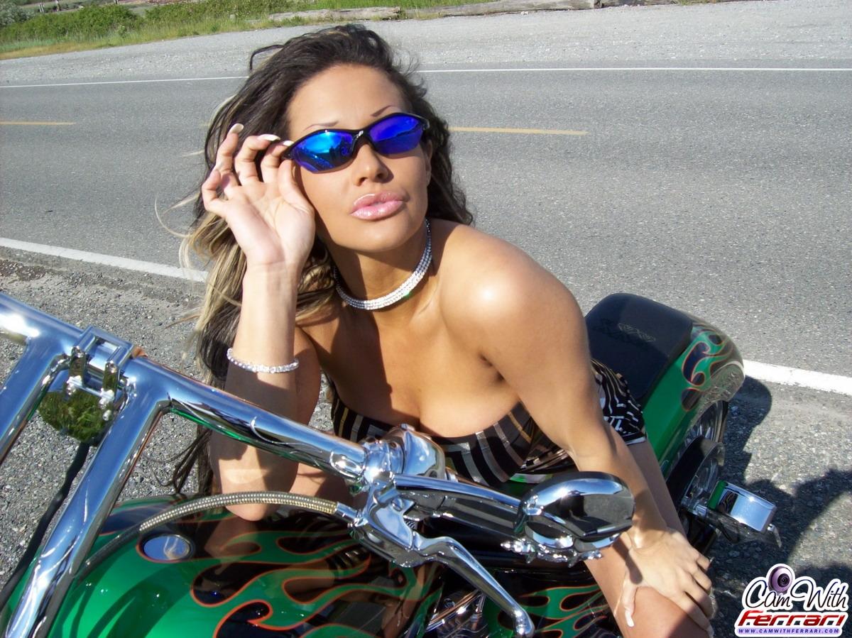 Pictures of teen babe Cam With Ferrari teasing on a motorcycle #53622111