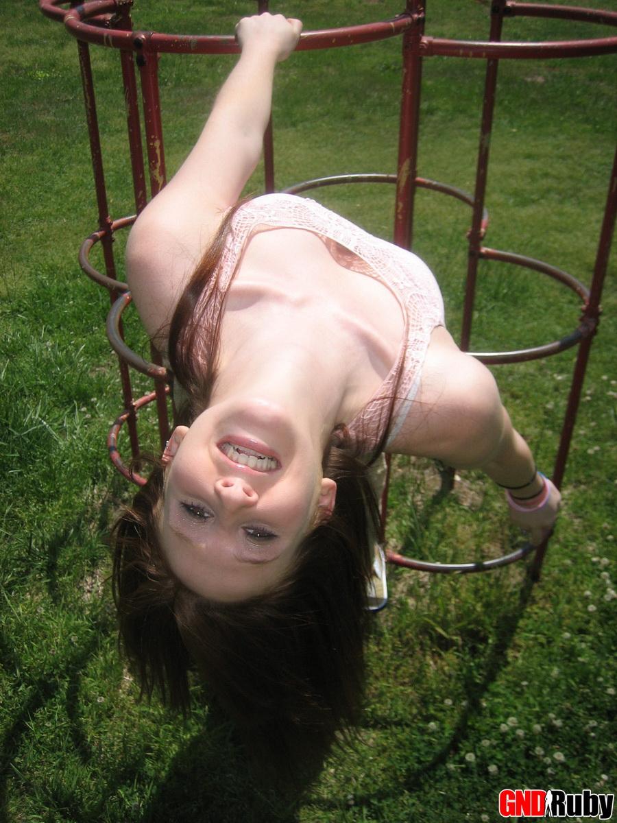 Cute ginger teen Ruby flashes her perky tits at the park while playing on the jungle gym #59948677