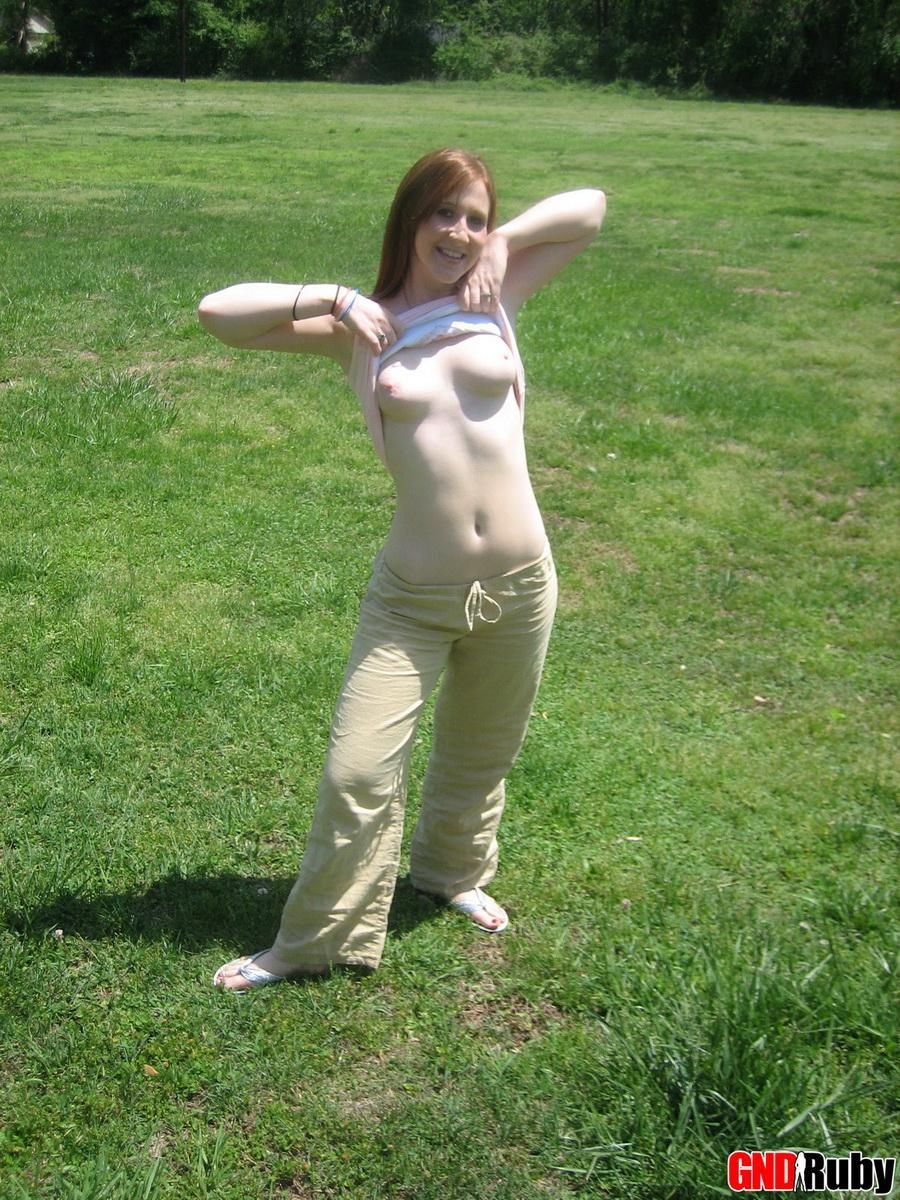 Cute ginger teen Ruby flashes her perky tits at the park while playing on the jungle gym #59948692