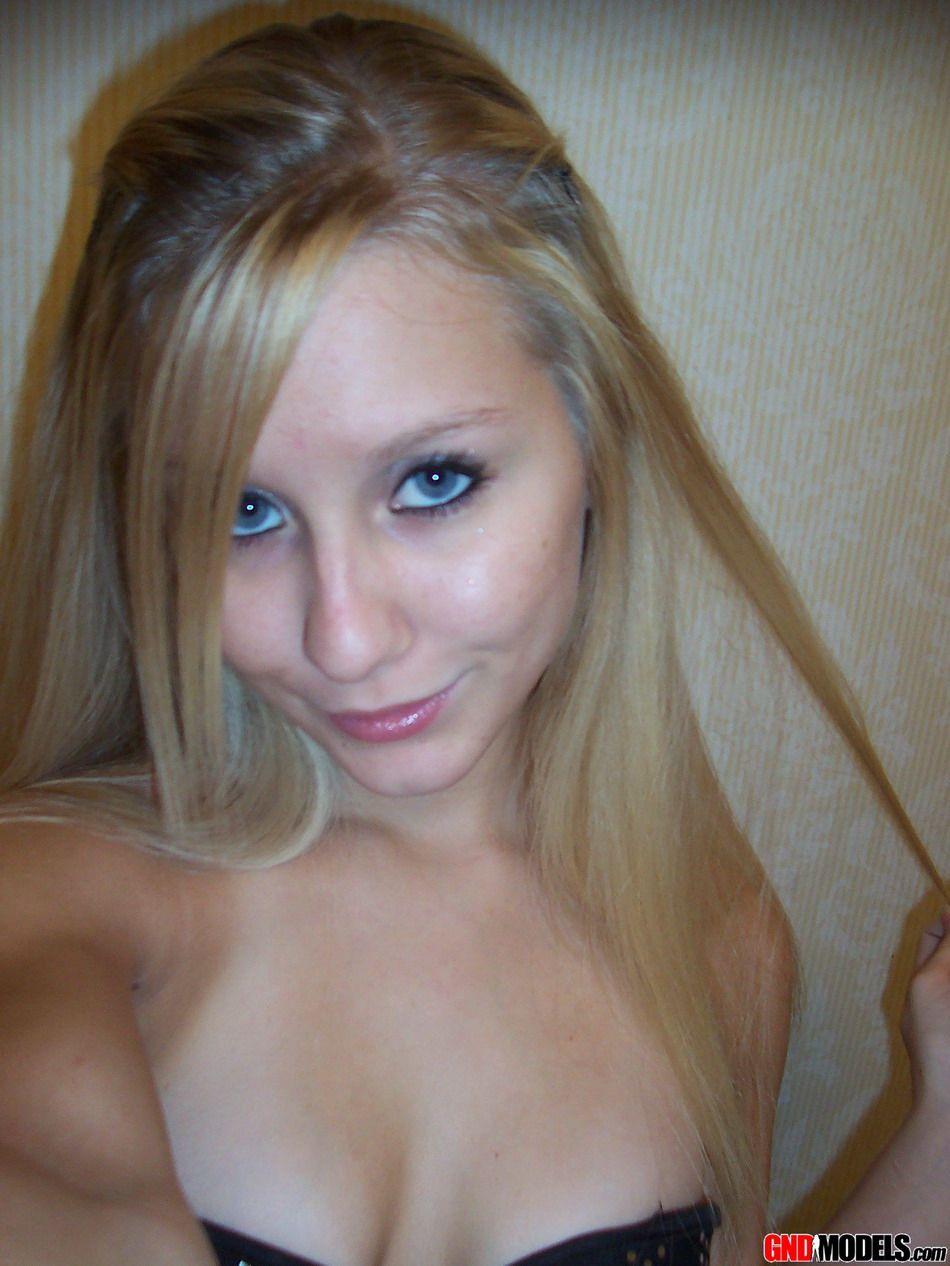 Pictures of a beautiful blonde girl showing off #60504509