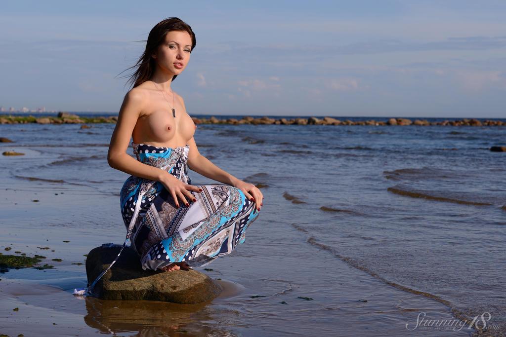Stunning brunette Sasha Rose strips naked on the Baltic Sea #59940193