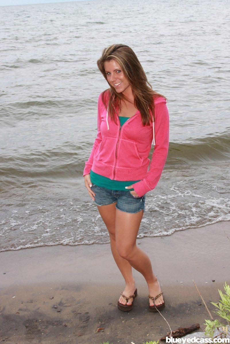 Pictures of Blueyed Cass getting wet on a beach #53454783