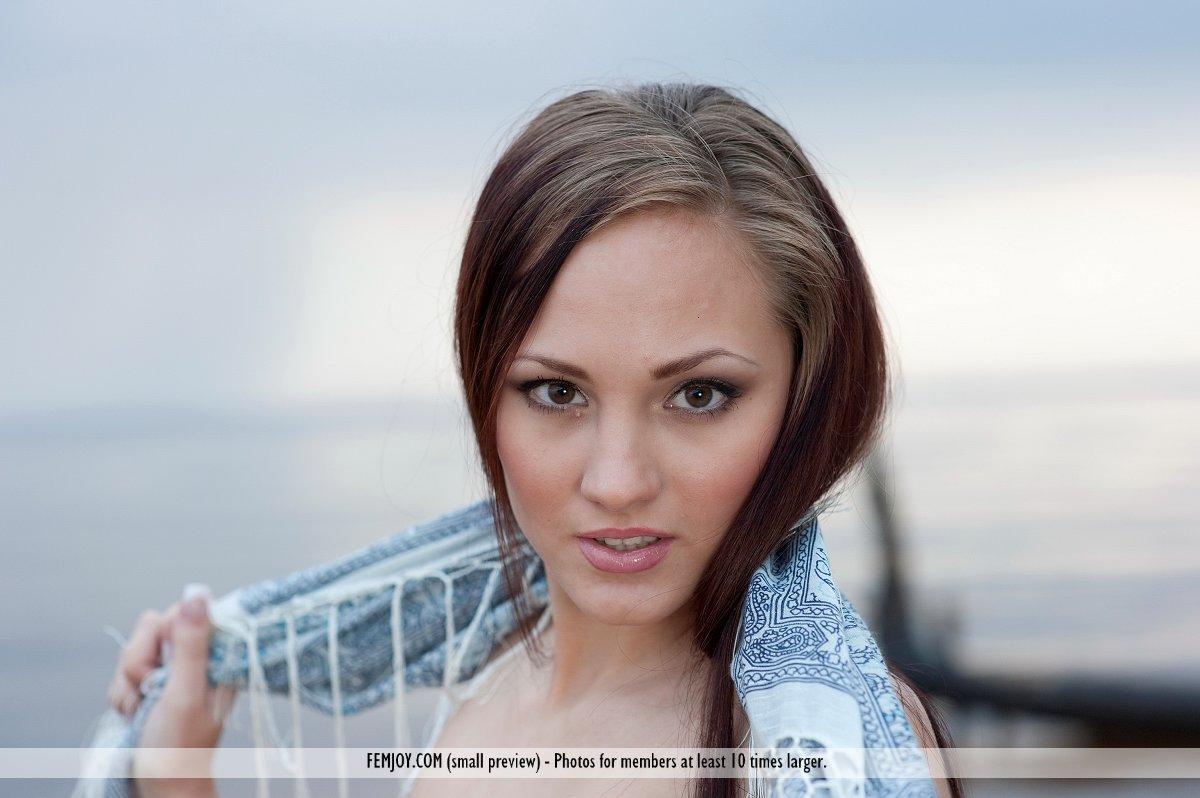 Pics of super sizzling teenager Ella K exhibiting her tight bare entire body on the seashore