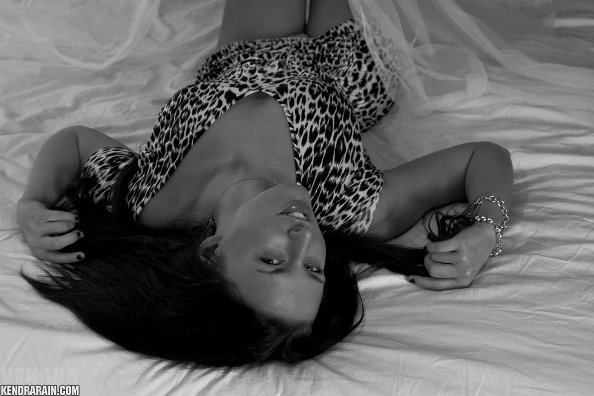 Brunette girl Kendra Rain does a sexy black and white set in her leopard dress #58722009