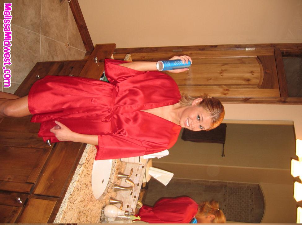 Melissa getting ready in the bathroom #59493948