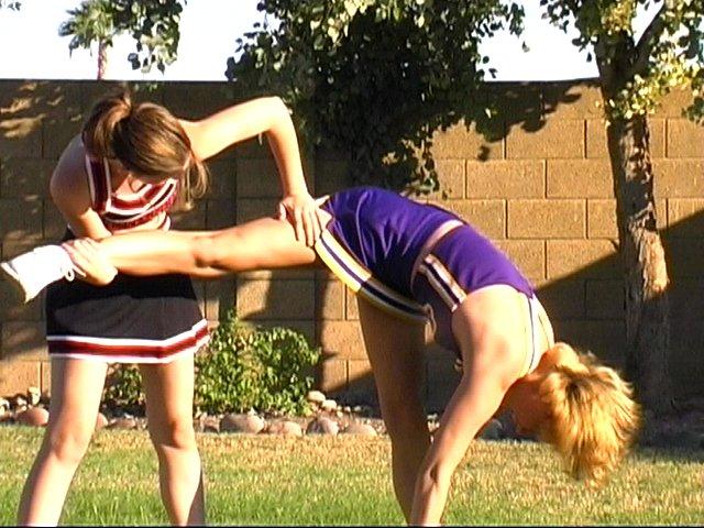 Pictures of two hot cheerleaders practicing their moves outside #60578149