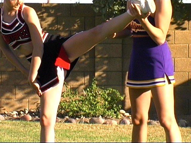 Pictures of two hot cheerleaders practicing their moves outside #60578201