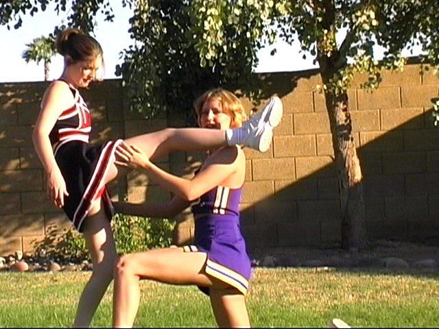 Pictures of two hot cheerleaders practicing their moves outside #60578235