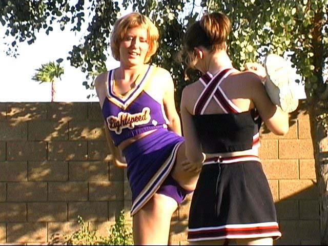 Pictures of two hot cheerleaders practicing their moves outside #60578307