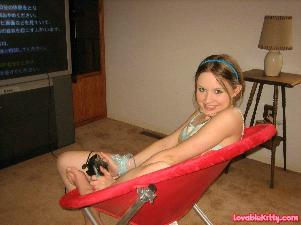 Pictures of teen girl Lovable Kitty getting kinky with a video game #58762511
