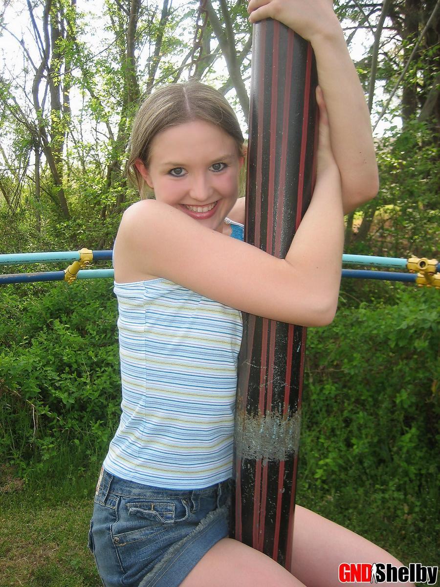 Perky girl next door Shelby shows off her perfect teenage breasts in the park on the jungle gym #58761792