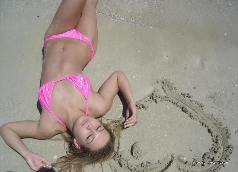 Sexy blonde bikini beach babe posing outdoors #60918096