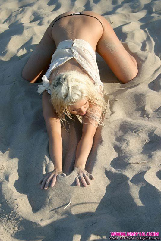 Pictures of teen Emy 18 teasing on a beach #54266733