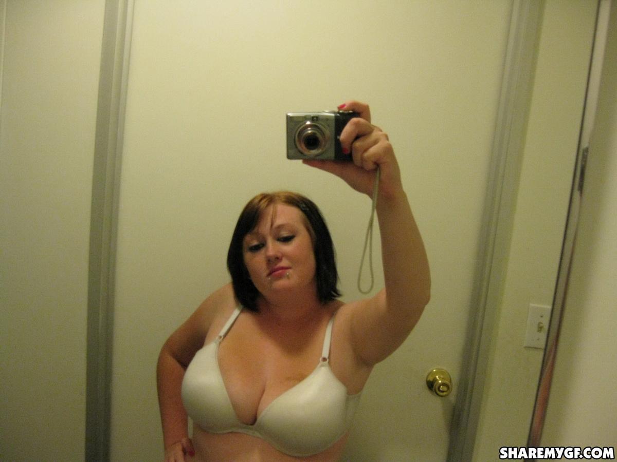 Chubby girlfriend takes selfshot pictures of her big natural tits in the mirror #60791704